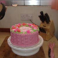 Basket Birthday Cake I made this cake for a 12 year old girl who's favorite color is pink. The icing is almond flover butter cream and the cake is white. I...