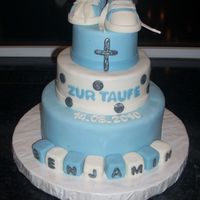 Baby Blocks And Sneakers bottom tier is carrot cake with white chocolate cream cheese frosting. top 2 tiers are white almost sour cream cake with chocolate fudge...