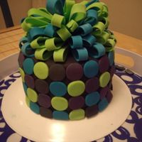 Birthday Cake Birthday/house warming cake, also practice for my brother's upcming wedding cake; One of the "ribbons" on the cake cracked...