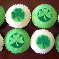 St. Patty's Cupcakes "Green" velvet cake with Bailey's BC and fondant toppers... They dyed everyone's mouths green but it fit the holiday...