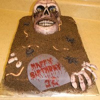 Skeleton This is a half sheet cake covered in BC and cookies for dirt. The skull is rice crispy treat covered in fondant. All other details are done...