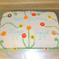 Fall Color Daisy Mother-in-law loves daisies and fall colors so I mixed the two to make her a cake. I was also asked to add her son since his birthday is...