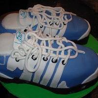 Golf Shoes Again, golf shoes, but these were modeled after a friend's husband's actual shoes. Cake covered in fondant and fondant...