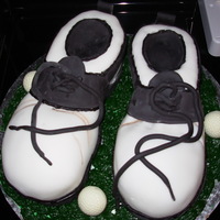 Golf Shoes This is my 2nd pair of golf shoes. Cake underneath, covered in fondant and fondant decorations.