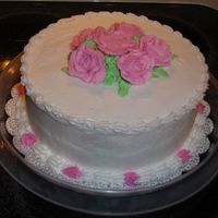 Wilton_I_Final_Cake.jpg Note To Self: Either get a taller cake carrier or bring a camera to class!!! This was the final cake for my Wilton I class. I thought the...