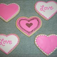 Heart Cookies Practicing with Antonia's Royal Cookie Icing. This is a dream to work with...but it dries VERY hard and crunchy.