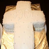 Baby's Christening Cake The third of three cakes made this past Saturday. Cross cakes are hard to get smooth! Cake is what I call "White Chocolate Cherry...