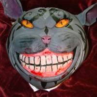 American Mcgee's Cheshire Cat A friend of mine wanted to surprise his girlfriend with this cake. She is a huge fan of American Mcgee. It was really fun to make.