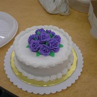Final Cake Of Wilton Course 1 Chocolate cake with raspberry filling. Butter cream icing the roses from heck- took me about 10 straight hours of non-stop practice to...