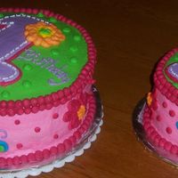Ady's 1St Birthday Cake With Crush Cake. French vanilla cake with BC icing. I made these cakes to match the napkins for the party.