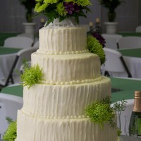 Ivory Classic all buttercream with fresh flowers.