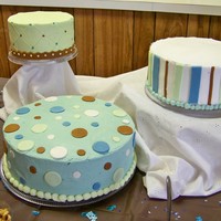 Baby Razz 10", 8", and 6" cakes with buttercream frosting and MMF decor. I chose to do satallite for convenience of cutting since it...