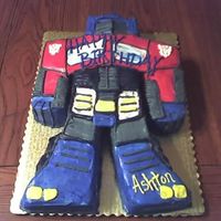 Optimus Prime This was for a little boys birthday , done in all buttercream , and just a simple white cake .... so much fun.Brings back memories .lol...