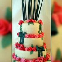 Birthday Rose Tower Can you tell I got peggy porschen's book this week!This is choc cake covered in white choc plastic and fondant details. I got the idea...