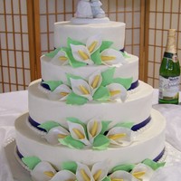 Calla Lilly Wedding Cake spice cake iced with buttercream; gumpaste calla lillies and leaves