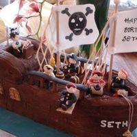 Captain Seth's Pirate Ship The pirate ship was put together using ideas from http://www.coolest-birthday-cakes.com/pirate-ship-cake.html and pictures from cake...