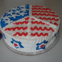 4Th Of July Peace Cake Vanilla cake with pink filling. All buttercream frosting with fondant stars