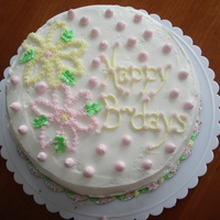 Birthday Cake French vanilla with vanilla mousse filling cake. Buttercream frosting