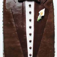 Chocolate Fondant Tuxedo My friend was throwing a bridal shower for her niece and wanted a groom cake and a bride cake to match the tux/dress theme. The tuxedo cake...