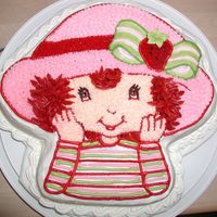 Strawberry Shortcake Version 1 This was my first character cake and it was for my friend's daughter. Took me forever but I was happy with the results.