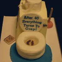 After 40... Idea borrowed from others! Toilet bowl covered in fondant- left the rest of cake in SMBC. Piping gel 'water' and candy clay '...
