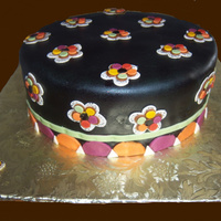 Inspired By A Purse I was making a cake for friends when I stumbled across an adorable purse with these flowers. I thought it was pretty and so i recreated in...