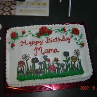 Birthday Cake The garden if FBCT. Yellow cake with buttercream icing. Having trouble with icing lately. Customer wanted buttercream roses also.