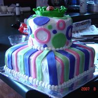 Baby Shower Sweet pea (need to work on my face) on a 10" square with stripes and 6" round with circles. Cake covered in BC with fondant...