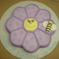 Flower And Bee 12 in cake carved into the flower. Gumpaste bumblebee. I got the inspiration from another CC member. Thanks!