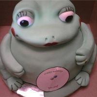 Lady Frog Triple Choc cake with choc buttercream icing covered with fondant. The picture does not do the color justice but she is a bright green. For...