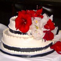 New Years Wedding Cake Carrot Cake, with cream cheese icing, also fresh flowers. I made this for a small wedding at a very fancy restaurant for tonight. I hope...
