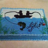 Going Fishing Chocolate cake with buttercream icing and fondant accents. Used a cake design found on this website and added a few touches.
