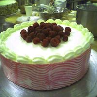 Raspberry Mousse Cake it's the first pink cake I made. White chiffon cake with raspberry mousse filling covered with chantilly cream. The pink sides are...