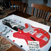 Birthday Guitar I made this guitar for a client who wanted a red guitar for her sons birthday.