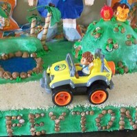 Peyton's 2Nd Birthday This was my grandson's 2nd birthday cake. His 3 teenage siblings made all the rocks on the cake. Everything was edible except Diego...