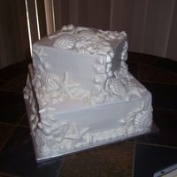 Seashell Wedding Buttercream icing with white chocolate seashells.