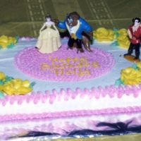 Beauty And The Beast My daughter wanted a Beauty and the beast cake. I used a couple of her figureines on top.