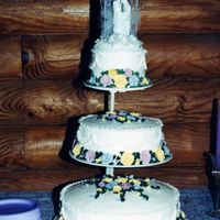 Dedicationpage168.jpg This was the second wedding cake I made for my son. They had a small wedding so we held a reception for them later.This was before we had a...
