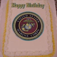 Usmc.jpg Quarter sheet cake made for a retired Marine...a little plain looking, as far as decorations go but that is all they wanted on the cake!