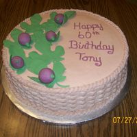 Fig Cake Customer requested a figs with fig leaves. They are done with gumpaste. Rest is buttercream.