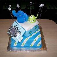 Monsters Inc Mike and Sully are made from gumpaste. Box top is gumpaste. Everything else is fondant. Thanks for looking. It was a fun cake to make.
