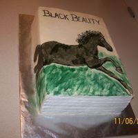 Black Beauty My customer wanted this for her book club. Binder portion of the cake is fondant and rest is buttercream. I painted the horse with a...