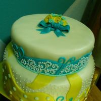 Peanut Butter Cake Peanut butter cake with buttercream, MMF & royal icing. MMF ribbon roses & bow.