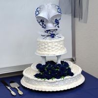 Dsc_0040-1.jpg The bride provided the topper and it was way too large for a cake that fed 50 people, so I did what I could! Her main wish was for it to...