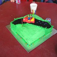 Harry's 3Rd Birthday Cake photos of Harrys Wiggles big red car 3rd birthday cake, grass at roadside kerb is piped with Wilton 233 tip, road is black sugar, musical...