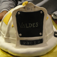 Helmet For District Chief Promotion I made this cake after viewing all the fire helmets here. Got inspired by so many wonderful decorators here. Thank you. Chocolate cake and...