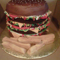 Burger And Fries triple decker cheeseburger made with chocolate cake. Fries were vanilla cake with fondant. First time using my airbrush.