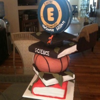 Graduation Cake With Basketball Theme Stacked up high, this grad cake was the center of my nephew's party. I used a center pole fastened, to a wood board. I used RCT for...