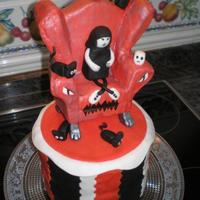 Emily The Strange Everything edible apart from the sofa which is made of expanded polyesterene covered in fondant.