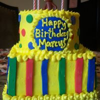 Curious George Birthday Totally inspired by MariaK! Her fondant work was much cleaner than mine. I used Wilton pre-colored fondant - lesson learned (never again...